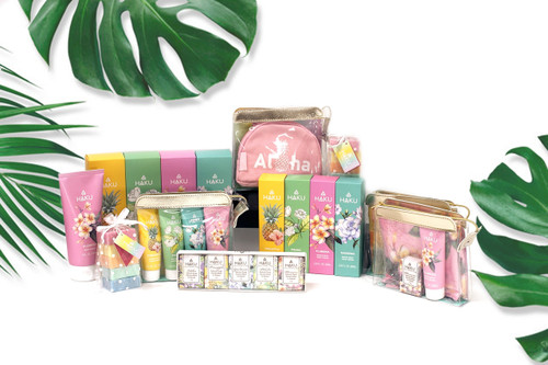 Different sets of HAKU - Body Serum 5 oz on white background with green leaves